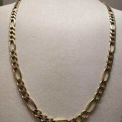 10KT 27.1 GRAMS GOLD FIGARO CHAIN 7mm WIDE