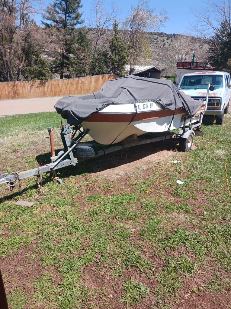 Trihull Boat With Trailer.