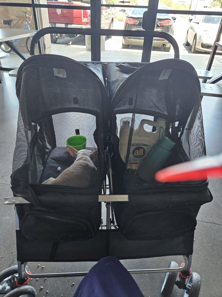 Dog stroller fits four dogs