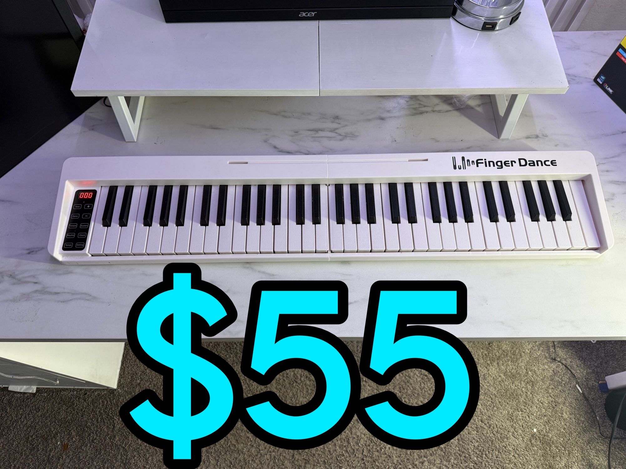 61 Key Wireless Foldable White Keyboard Piano $55