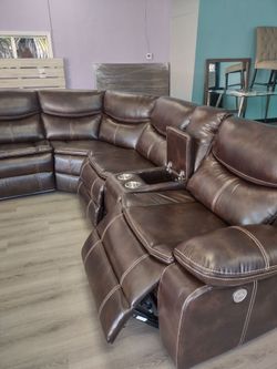 New power sectional sofa with three power recliners