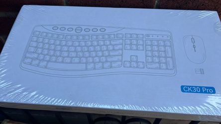 Brand new Wireless Ergonomic Keyboard and Mouse Combo in Black.