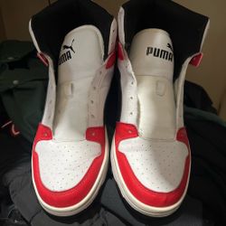 Puma high top sneakers size 9.5