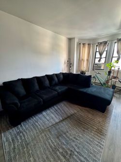 Black L shaped sectional sofa