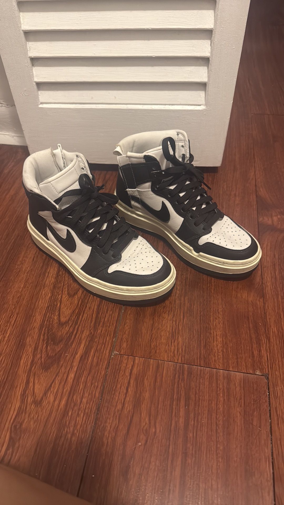 Nike Women’s Black and White High-Top Sneakers