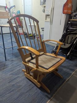 Wooden glider rocker chair. No cushion included. Good condition. 14in to seat