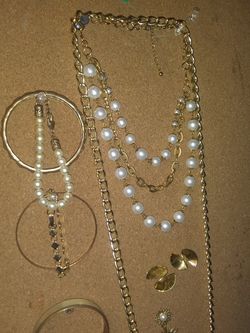 Matching aet includes vintage mother of pearl and brass bangle