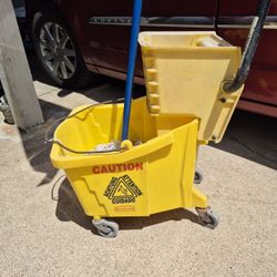 Nice Used Yellow Rubbermaid Mop Bucket. 