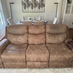 Three-seater leather reclining sofa 