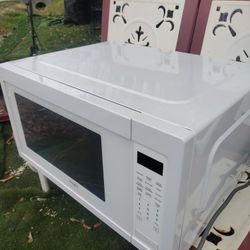 Microondas Marca Whirlpool Semi Nuevo 24 De largo 18 De Ancho 