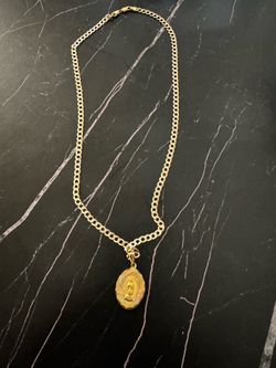 Chain with 14 carat charm