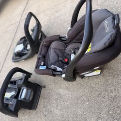 Graco SnugRide SnugFit Infant Car Seat and 2 bases in good condition 