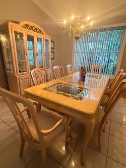 Dinning table with 8 chairs and china cabinet