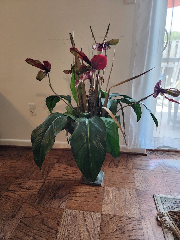 Floral Arrangement In Lady Slipper Vase