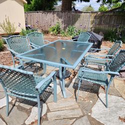 Large Glass Outdoor Table And 6 Chairs