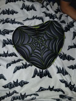 LOVE PAIN AND STITCHES  GREEN HEART PURSE 