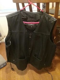 Genuine leather motorcycle vest.
