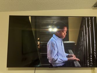 TCL Flat Screen TV Wall Mounted 65”