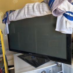 Tv.   Washer And Dryer 