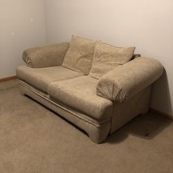 Tan loveseat