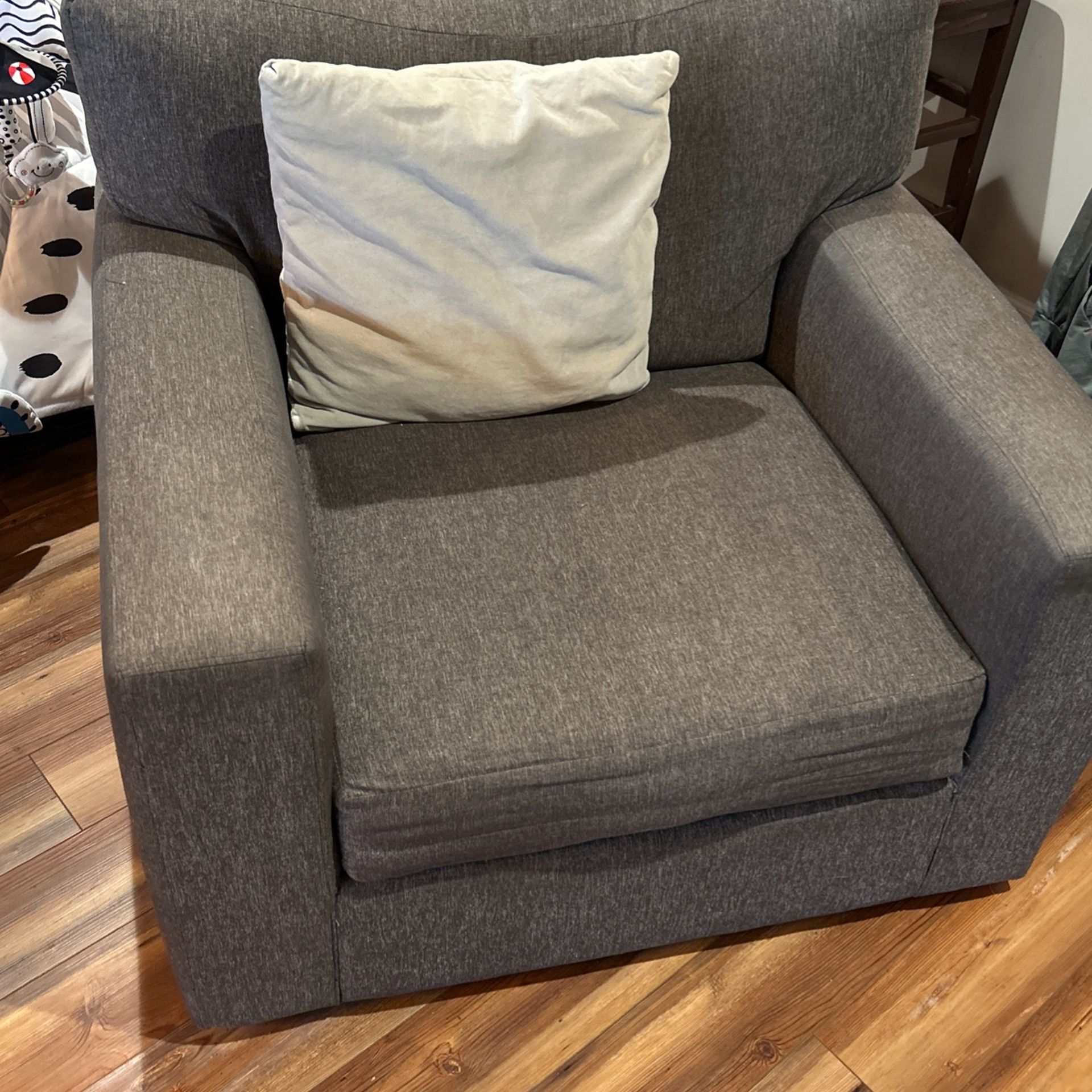 Large Gray Swivel Chair