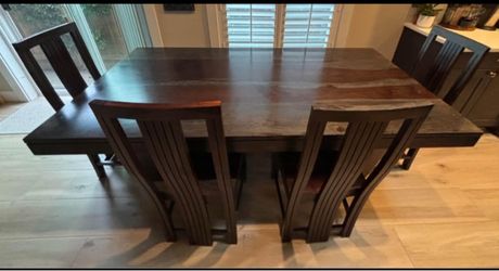 solid Sheesham wood dining table with 4 chairs and 1 bench.