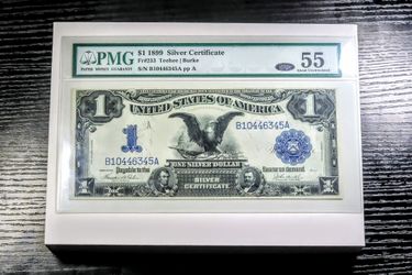 1899 US $1 silver certificate Black eagle PMG AU 55