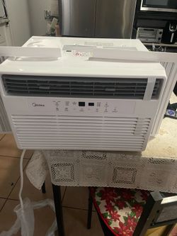 New in box. Midea air conditioner 8,000 Btu