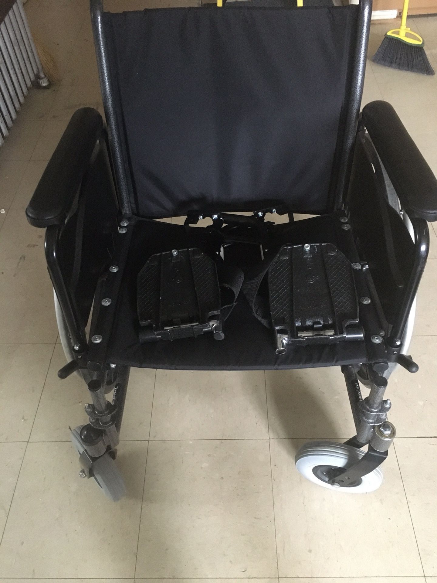 Invocare large wheelchair with feet