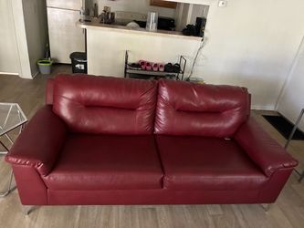 Red leather couch and love seat