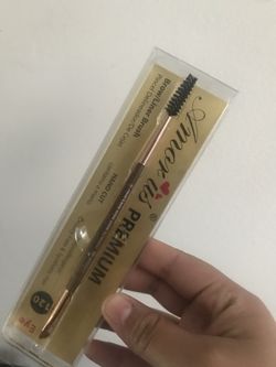 Eyebrow brush