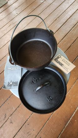 New Lodge 10 inch, 4 quart Cast Iron Dutch Oven Classic campsite cooker. Flanged lid holds hot coals for cooking or flips to serve as a griddle. SW AU