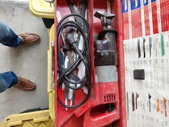 Milwaukee  Sawzall, {heavy duty}  with detachable cord and new blades