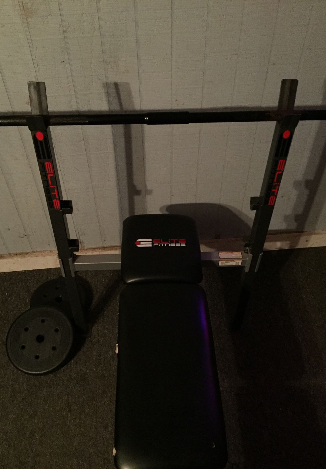 Weight bench with leg curls