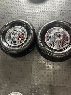 65 Mustang rims with new tires great shape