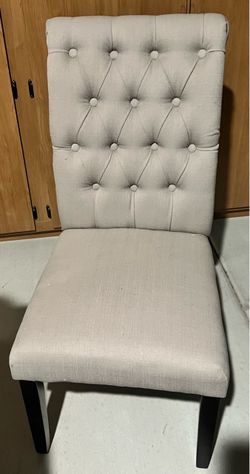 2 cream/tan dining chairs