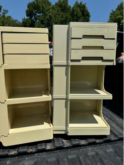 2 Cabinets on wheels with pull out drawers , cup holder