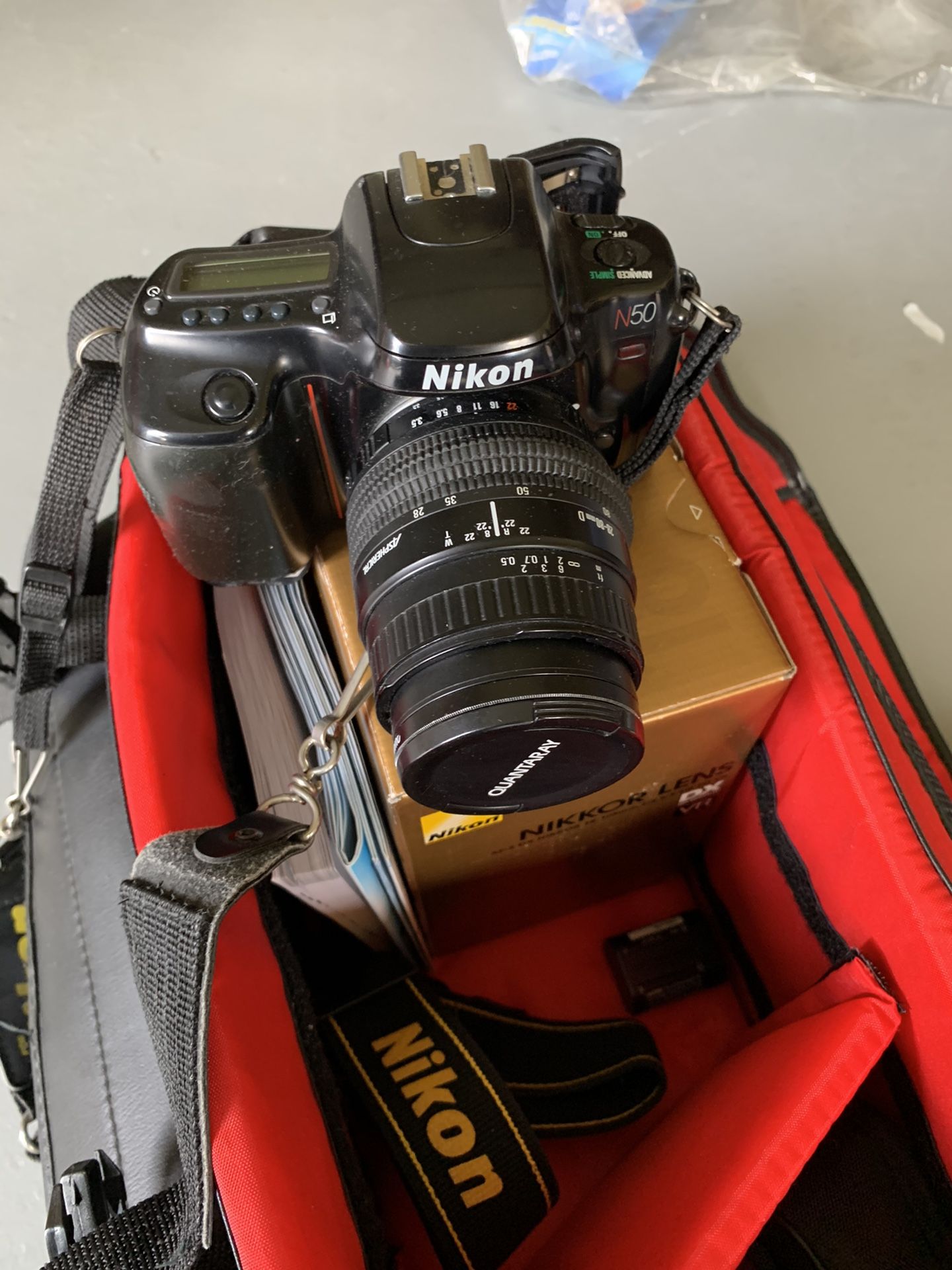 Nikon camera, bag and extra lens