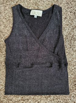 Vintage Cache S black sparkle wrap tank top blouse Small metalic silver shirt

Size small, V neck wrap design top
See thru material,  light stretch 
E