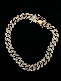 Iced gold tennis bracelet, size 8, 10 mm band, 14k stamped