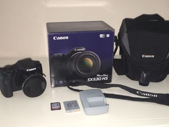 DSLR camera NEW WITH BOX AND ACCESSORIES