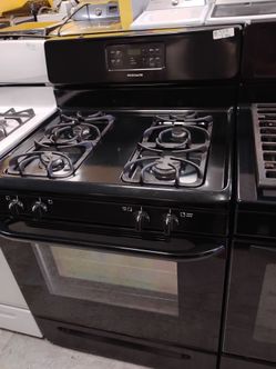 Black gas four burners everything works with warranty