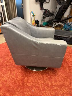 Leather swivel lounge chair