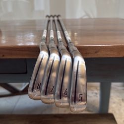 Irons 5,6,7,8 Taylor made Qi Irons With Custom Black And Whit Grip 