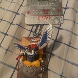 NEW 2022 Disney Sketchbook Ornament Marvel Captain America Falcon Figurine  Brand new marvel Christmas ornament  New in sealed box  Picture is of my d