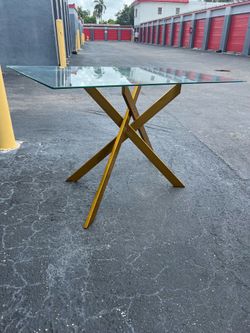Gold glass table 51”x29