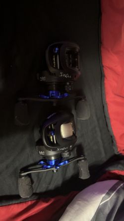 Two sixgill bait caster reels