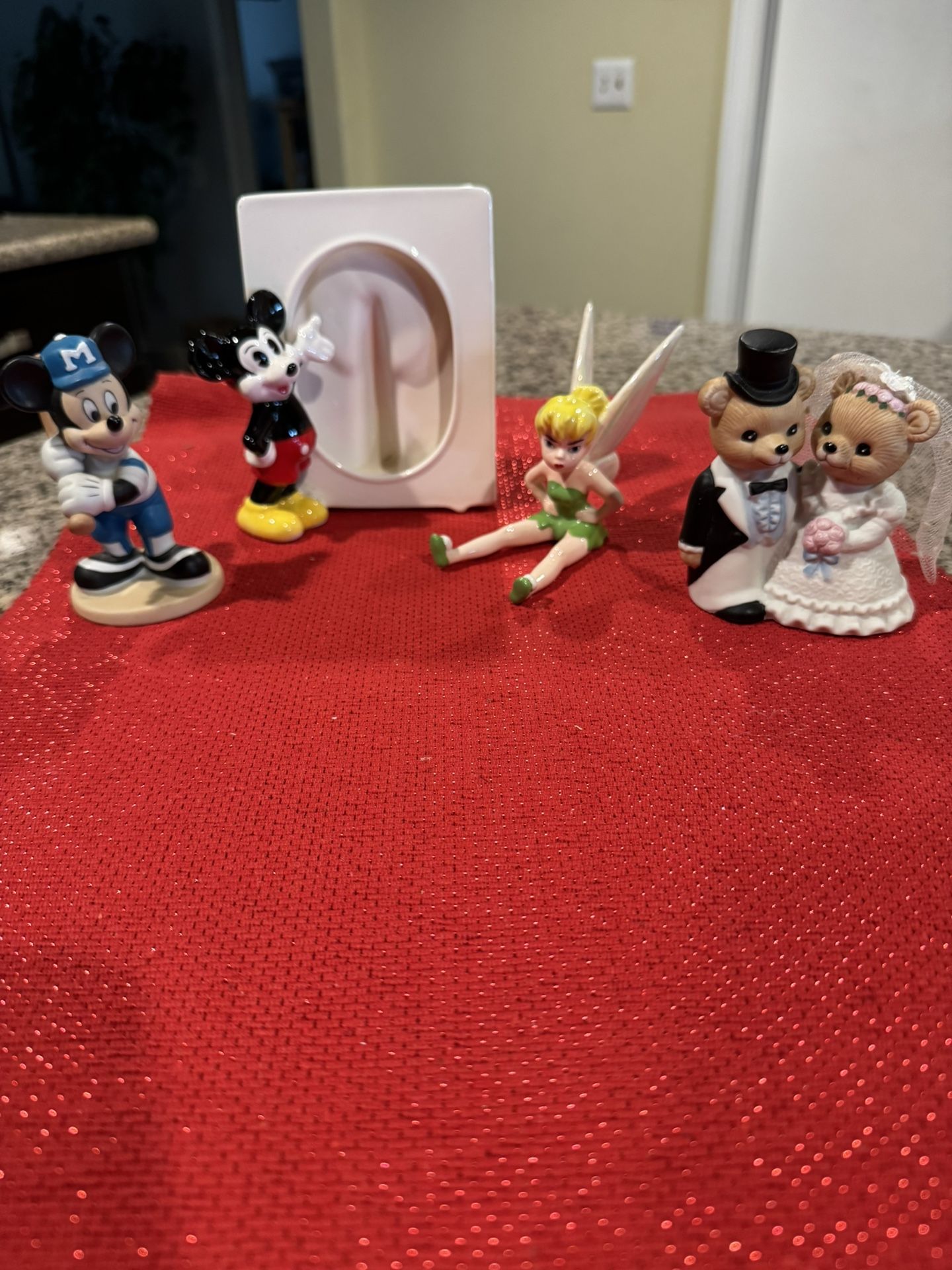 Mickey Mouse , tinker bell, and wedding bears