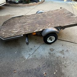 Motorcycle And Flatbed Trailer 