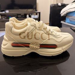 Cream and white Gucci trainers
